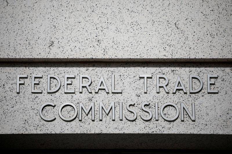 FILE PHOTO: A view of signage at the Federal Trade Commission (FTC) headquarters in Washington, D.C., U.S., November 24, 2024. REUTERS/Benoit Tessier/File Photo