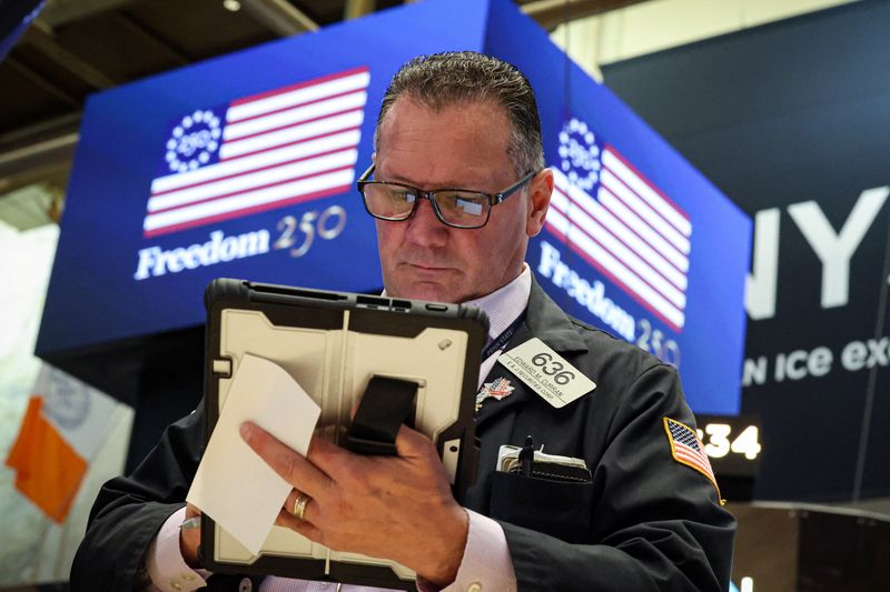 A trader works on the floor at the New York Stock Exchange (NYSE) in New York City, U.S., April 20, 2026.  REUTERS/Brendan McDermid