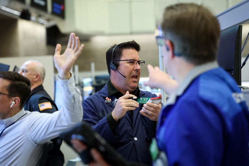 Futures-options traders work on the floor at the New York Stock Exchange's NYSE American (AMEX) in New York City, U.S., April 20, 2026.  REUTERS/Brendan McDermid