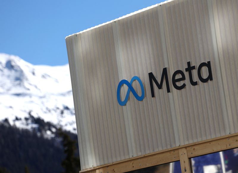 The logo of Meta is seen at the entrance of the company's temporary stand ahead of the World Economic Forum (WEF) in Davos, Switzerland January 18, 2025. REUTERS/Yves Herman