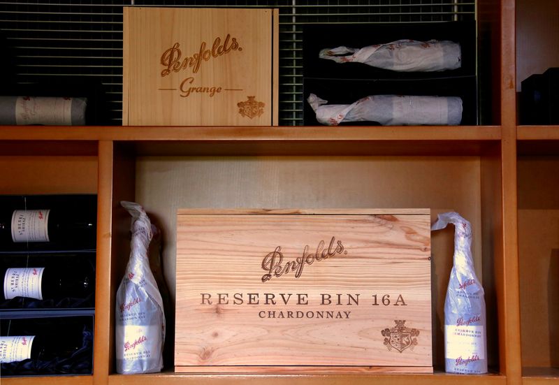 Bottles of Penfolds Grange wine and other varieties, made by Australian wine maker Penfolds and owned by Australia's Treasury Wine Estates, sit on shelves for sale at a winery located in the Hunter Valley, north of Sydney, Australia, February 14, 2018. REUTERS/David Gray