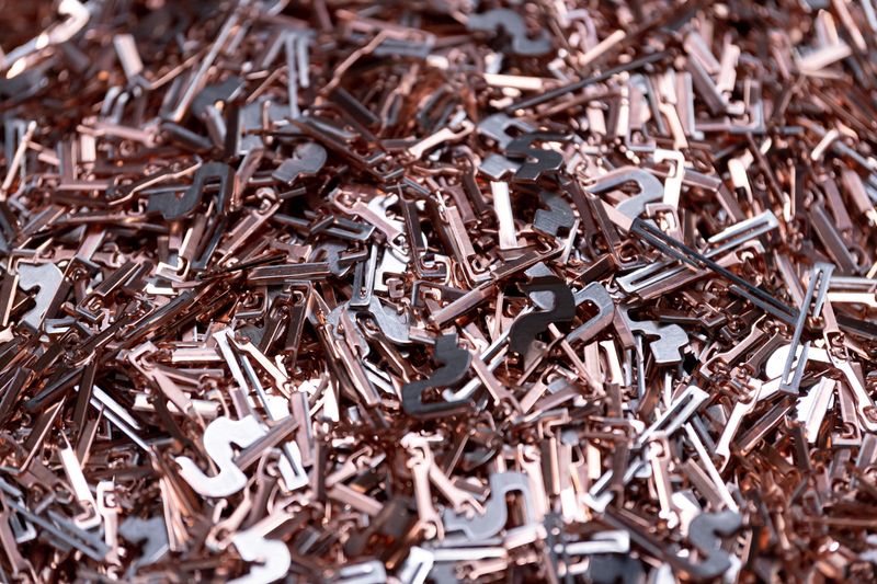 Remaining metal parts are collected in a box at TE Connectivity in Woerth, Germany, February 16, 2022. Picture taken February 16, 2022. REUTERS/Lukas Barth