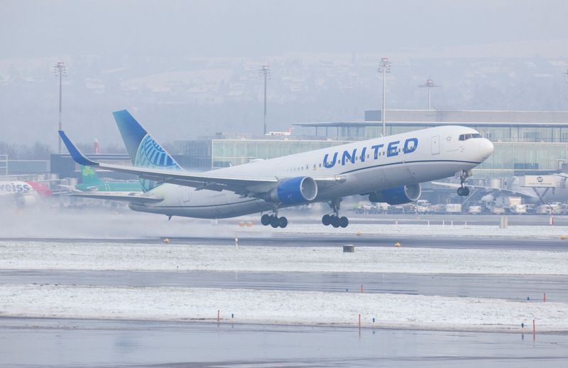 FILE PHOTO: A Boeing 767-322ER aircraft of United Airlines takes off during cold winter weather from Zurich Airport near Ruemlang, Switzerland, December 14, 2022.  REUTERS/Arnd Wiegmann/File Photo