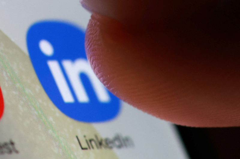 The LinkedIn app icon on a smartphone in this illustration taken October 27, 2025. REUTERS/Dado Ruvic/Illustration