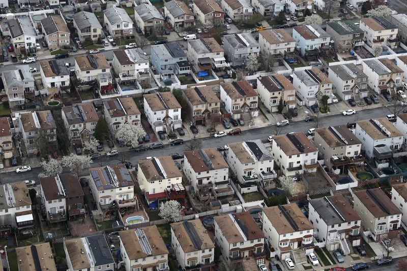 FILE PHOTO: A densely populated residential neighborhood of Staten Island is seen from above New York City, U.S., March 30, 2020. REUTERS/Mike Segar/File Photo