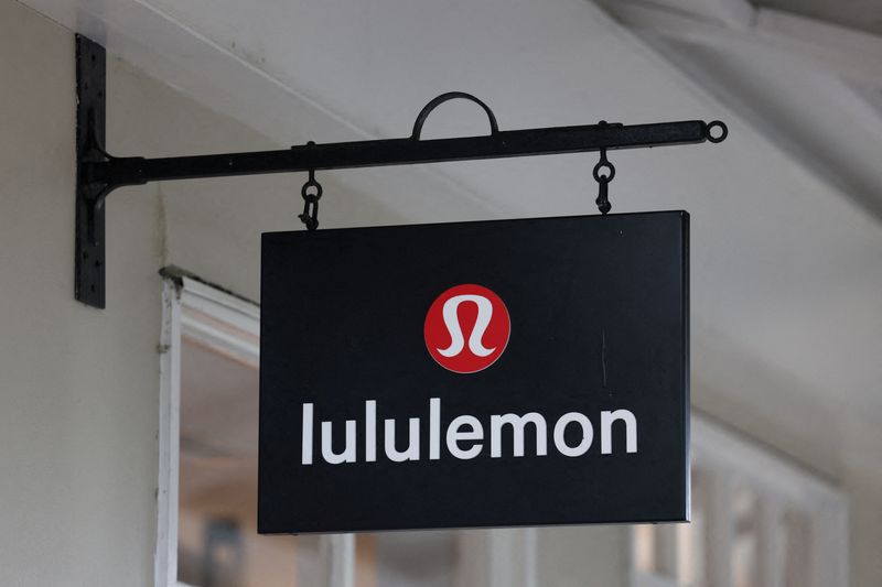 A logo is displayed above a Lululemon outlet retail store at Bicester Village in Oxfordshire, Britain, August 21, 2024. REUTERS/Hollie Adams