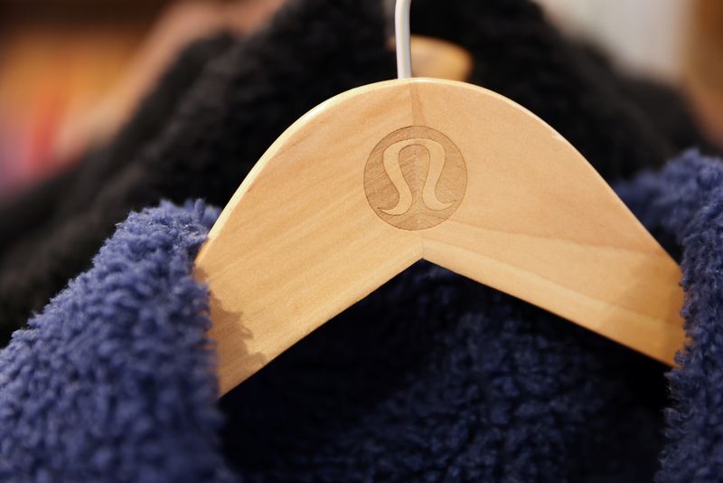 The logo for Lululemon Athletica is seen on a hanger in a store in Manhattan, New York, U.S., December 7, 2021. REUTERS/Andrew Kelly