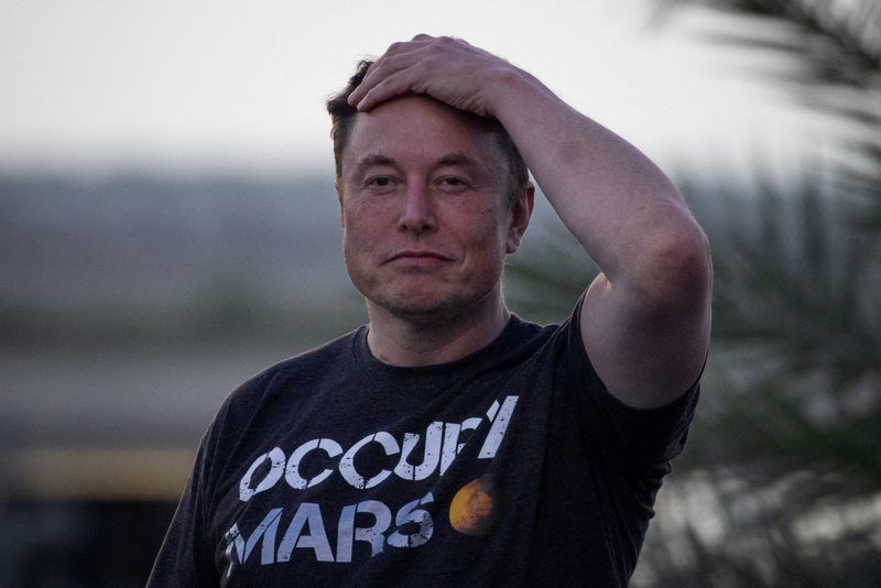 FILE PHOTO: SpaceX Chief Engineer Elon Musk takes part in a news conference at the SpaceX Starbase, in Brownsville, Texas, U.S., August 25, 2022. REUTERS/Adrees Latif/File Photo
