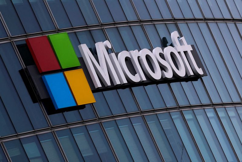 FILE PHOTO: A view shows a Microsoft logo at Microsoft offices in Issy-les-Moulineaux near Paris, France, March 21, 2025. REUTERS/Gonzalo Fuentes/File Photo