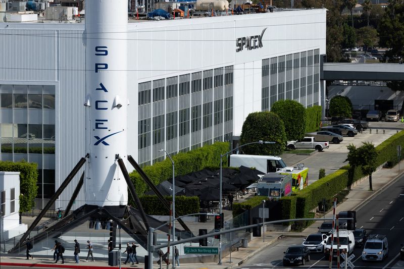 The SpaceX facility and a Falcon 9 rocket booster are shown, as the company prepares to file for an initial public offering (IPO), in Hawthorne California, U.S., April 23, 2026. REUTERS/Mike Blake