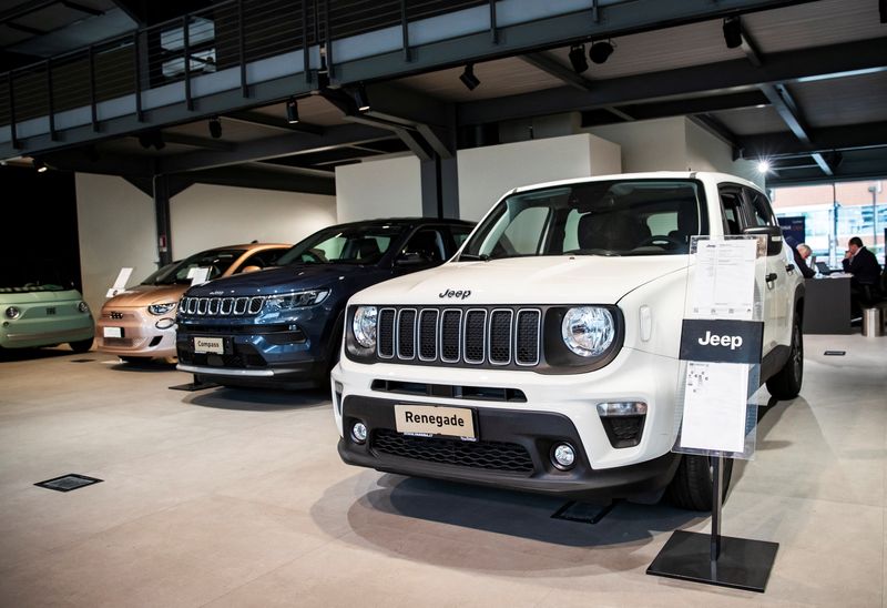 Jeep vehicles are displayed at the showroom of a car dealership in Milan, Italy, November 21, 2024. REUTERS/Alessandro Garofalo