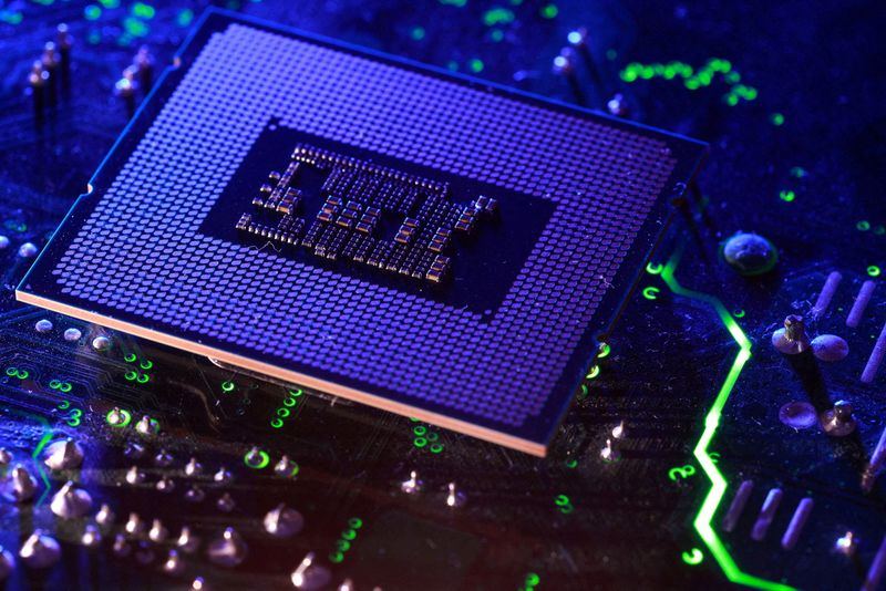FILE PHOTO: Computer motherboard and Intel chip appear in this illustration taken August 25, 2025. REUTERS/Dado Ruvic/Illustration/File Photo
