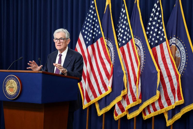 FILE PHOTO: U.S. Federal Reserve Chair Jerome Powell holds a press conference following a two-day meeting of the Federal Open Market Committee (FOMC), at the Federal Reserve in Washington, D.C., U.S., March 18, 2026. REUTERS/Kevin Lamarque/File Photo