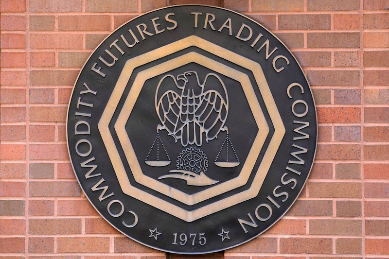 FILE PHOTO: Signage is seen outside of the US Commodity Futures Trading Commission (CFTC) in Washington, D.C., U.S., August 30, 2020. REUTERS/Andrew Kelly/File Photo