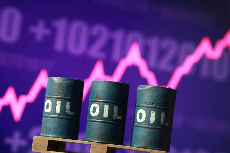 3D printed oil barrels and rising stock graph are seen in this illustration taken March 23, 2026. REUTERS/Dado Ruvic/Illustration