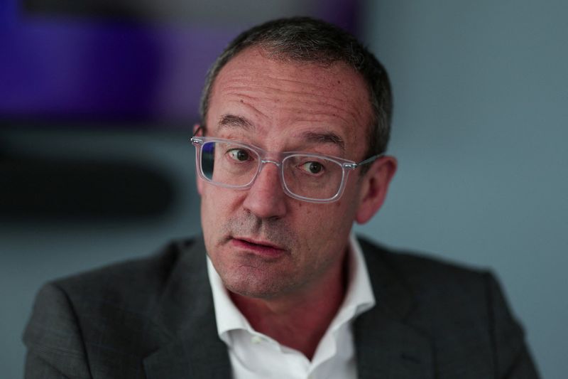 FILE PHOTO: Jean-Francois Fallacher, Chief Executive Officer of European satellite operator Eutelsat, speaks during an interview at the company's headquarters in Issy-les-Moulineaux, near Paris, France, March 30, 2026. REUTERS/Gonzalo Fuentes/File Photo