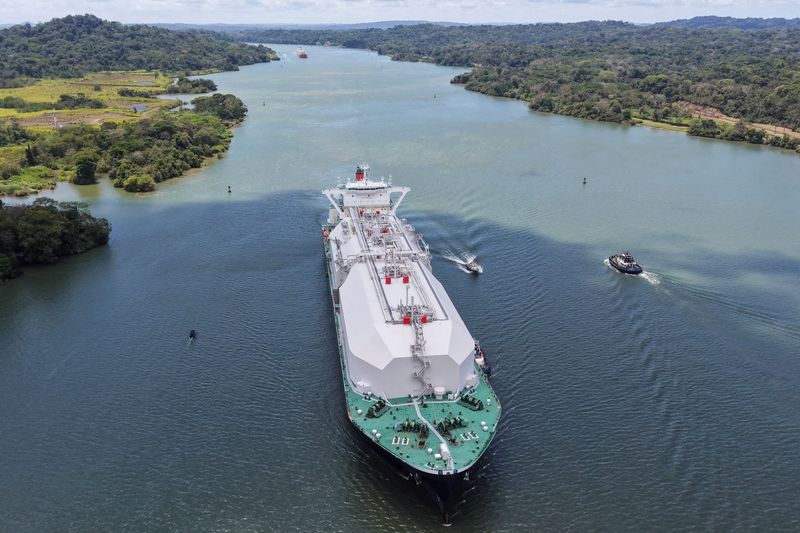 FILE PHOTO: A drone view shows the Bahamas‑flagged LNG tanker Nohshu Maru sailing through the Panama Canal as it operates at top capacity, with the war in Iran boosting demand from owners and operators of liquefied natural gas vessels, in Gamboa City, Panama, March 24, 2026. REUTERS/Enea Lebrun/File Photo