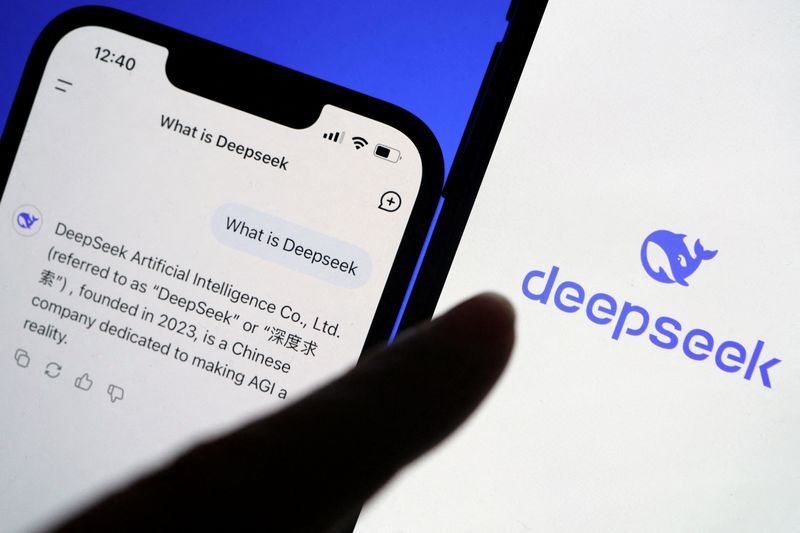 FILE PHOTO: The logo of DeepSeek is displayed alongside its AI assistant app on a mobile phone, in this illustration picture taken January 28, 2025. REUTERS/Florence Lo/Illustration/File Photo