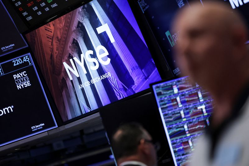 FILE PHOTO: NYSE logo is displayed on a screen at the New York Stock Exchange (NYSE) in New York City, U.S., September 22, 2025. REUTERS/Jeenah Moon/File Photo