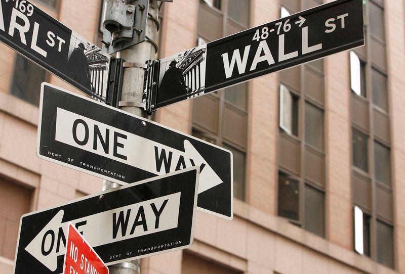 FILE PHOTO: A Wall St. sign is seen in New York's financial district September 16, 2008. REUTERS/Lucas Jackson/File Photo