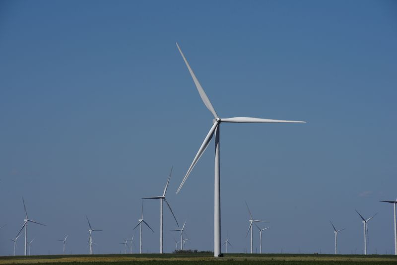 Wind turbines generate power on a farm near Throckmorton, Texas U.S. August 24, 2018. Picture taken August 24, 2018. REUTERS/Nick Oxford/File Photo