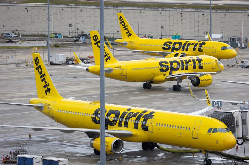 Spirit Airlines airplanes sit parked at Fort Lauderdale - Hollywood International Airport, in Fort Lauderdale, Florida, U.S., April 23, 2026. REUTERS/Marco Bello