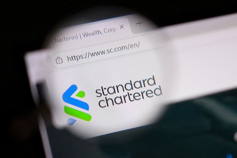 FILE PHOTO: Standard Chartered logo is seen in this illustration taken January 7, 2026. REUTERS/Dado Ruvic/Illustration/File Photo