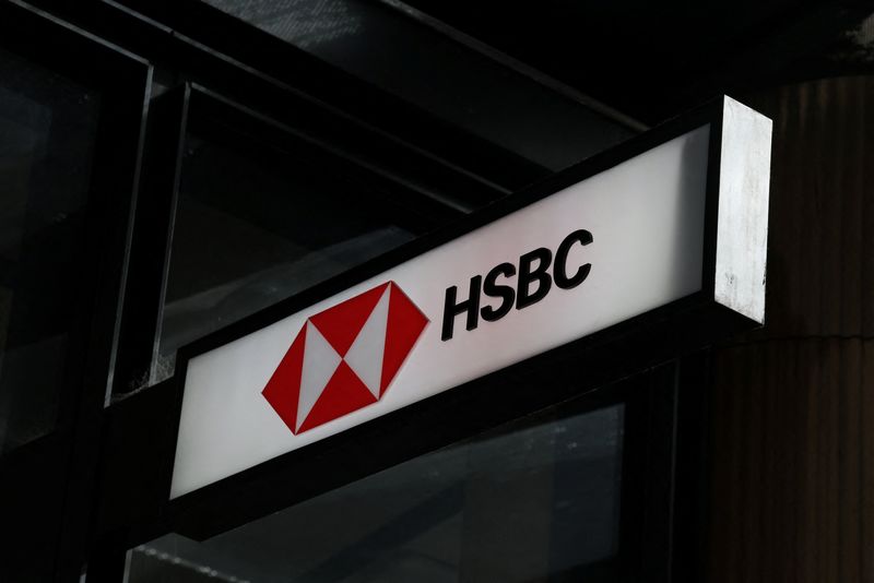 FILE PHOTO: A Hongkong and Shanghai Banking Corporation (HSBC) logo is displayed outside a bank branch in Sydney, Australia, August 19, 2025. REUTERS/Hollie Adams/File Photo