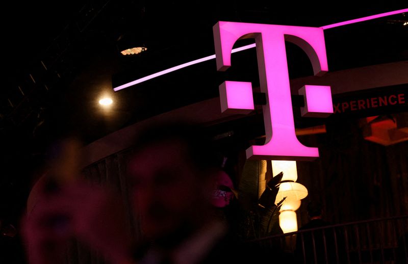FILE PHOTO: The logo of Deutsche Telekom is pictured at the GSMA's 2023 Mobile World Congress (MWC) in Barcelona, Spain February 28, 2023. REUTERS/Nacho Doce/File Photo