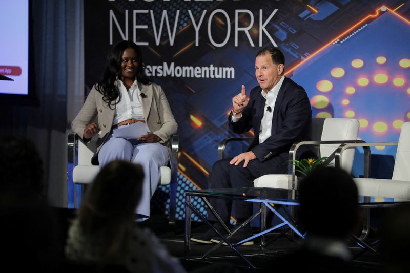 Authentic Brands Founder, Chairman and CEO Jamie Salter speaks with Reuters Correspondent Arriana McLymore in a Reuters NEXT Newsmaker interview at the Momentum AI summit on April 28, 2026, in New York.  Jim Hinson/Stanton Media/Handout via REUTERS