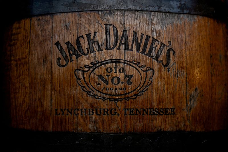 FILE PHOTO: A Jack Daniel's whiskey logo can be seen on a barrel at the company's distillery in Lynchburg, Tennessee, U.S. February 3, 2025. REUTERS/Kevin Wurm/File Photo