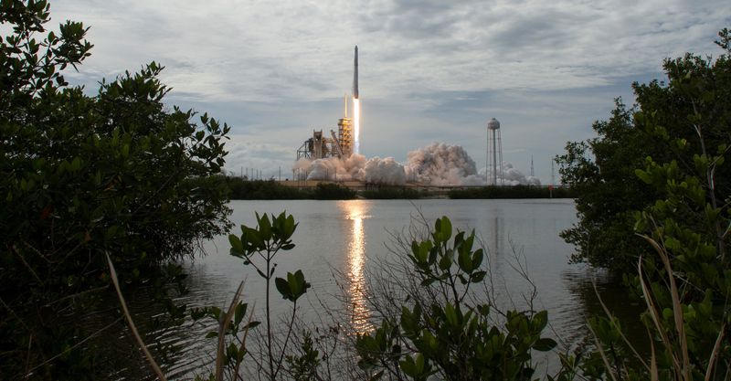FILE PHOTO: The SpaceX Falcon 9 rocket, with the Dragon spacecraft onboard, launches from pad 39A at NASA's Kennedy Space Center in Cape Canaveral, Florida, U.S., June 3, 2017. NASA/Bill Ingalls/Handout via REUTERS/File Photo