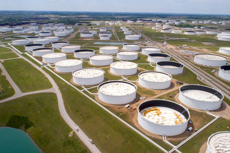 FILE PHOTO: Crude oil storage tanks are seen in an aerial photograph at the Cushing oil hub in Cushing, Oklahoma, U.S. April 21, 2020. REUTERS/Drone Base/File Photo