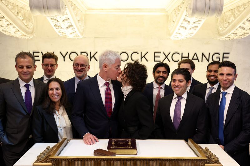 Bill Ackman, founder and CEO of Pershing Square Inc., poses with his wife, Neri Oxman, during his company’s IPO at the New York Stock Exchange (NYSE), in New York City, U.S., April 29, 2026. REUTERS/Brendan McDermid