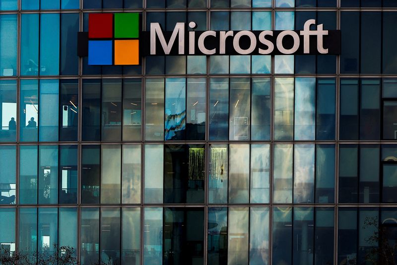 FILE PHOTO: A view shows a Microsoft logo at Microsoft offices in Issy-les-Moulineaux near Paris, France, January 9, 2025. REUTERS/Gonzalo Fuentes/File Photo