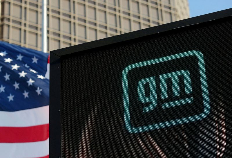 FILE PHOTO: The new GM logo is seen on the facade of the General Motors headquarters in Detroit, Michigan, U.S., March 16, 2021. Picture taken March 16, 2021.  REUTERS/Rebecca Cook/File Photo
