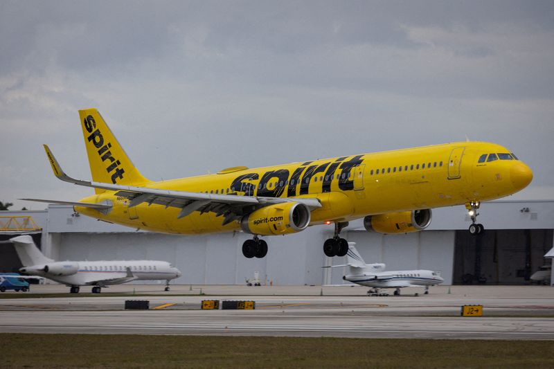 FILE PHOTO: A Spirit Airlines flight arrives at Fort Lauderdale - Hollywood International Airport, in Fort Lauderdale, Florida, U.S., April 23, 2026. REUTERS/Marco Bello/File Photo