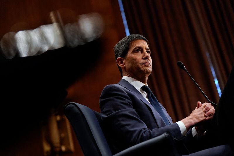 FILE PHOTO: Kevin Warsh, U.S. President Donald Trump's nominee to be next chair of the Federal Reserve, attends a Senate Banking Committee confirmation hearing to testify, on Capitol Hill in Washington, D.C., U.S., April 21, 2026. REUTERS/Elizabeth Frantz/ File Photo