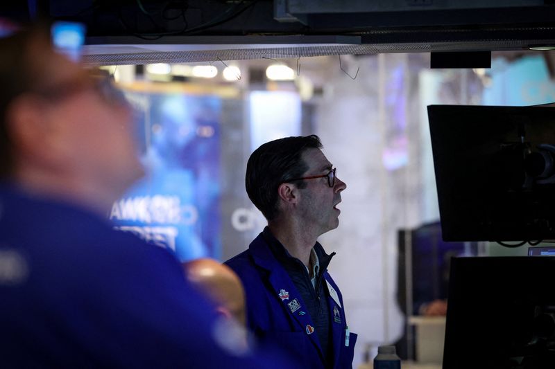 Traders work on the floor at the New York Stock Exchange (NYSE) in New York City, U.S., April 29, 2026.  REUTERS/Brendan McDermid