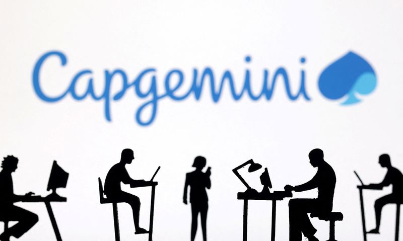 Figurines with computers and smartphones are seen in front of Capgemini logo in this illustration taken, February 19, 2024. REUTERS/Dado Ruvic/Illustration