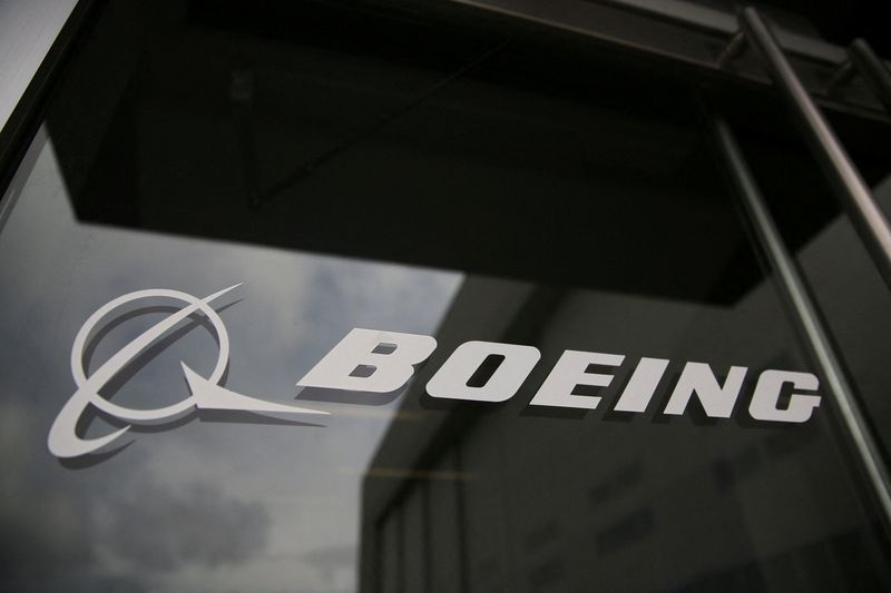 The Boeing logo on the doors to the Boeing factory in Renton, Washington, U.S., April 15, 2026.   REUTERS/Genna Martin