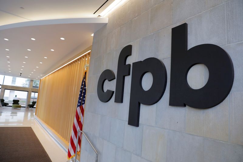 FILE PHOTO: Signage is seen at the Consumer Financial Protection Bureau (CFPB) headquarters in Washington, D.C., U.S., May 14, 2021. REUTERS/Andrew Kelly/File Photo