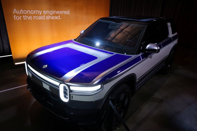 Rivian R2 is showcased at the company's first Autonomy and AI Day showcasing developments in self-driving technology, in Palo Alto, California, U.S., December 11, 2025. REUTERS/Carlos Barria