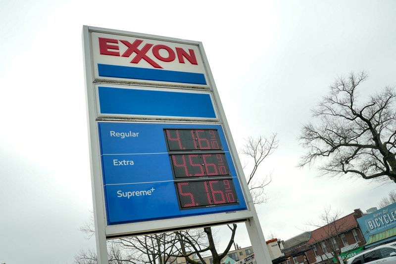 FILE PHOTO: Gas prices are seen at an Exxon station in Washington, D.C., U.S., March 5, 2026. REUTERS/Ken Cedeno/File Photo