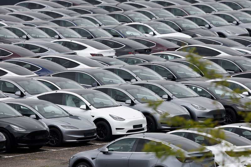 FILE PHOTO: Tesla electric vehicles are pictured at one of the company's delivery centers in Valenton, near Paris, France, April 24, 2025. REUTERS/Benoit Tessier/File Photo