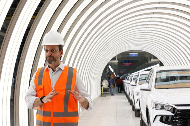 FILE PHOTO: BYD Senior Vice President in Brazil, Alexandre Baldy, speaks during an interview with Reuters, on the production line at the company's new electric vehicle factory at the Industrial Complex in Camacari, Bahia, Brazil, February 3, 2026. REUTERS/Rafael Martins/File Photo