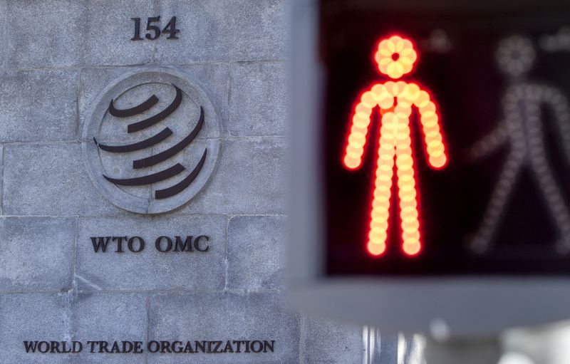 A logo is seen at the World Trade Organization (WTO) headquarters before a news conference in Geneva, Switzerland, October 5, 2022. REUTERS/Denis Balibouse