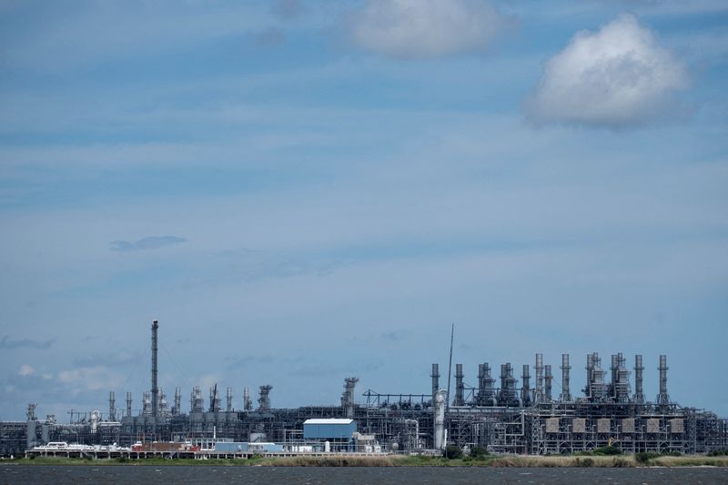 FILE PHOTO: A view of Cheniere's Sabine Pass LNG facility located in Cameron Parish, Louisiana, as seen from Port Arthur, Texas, U.S., June 23, 2025. REUTERS/Joel Angel Juarez/File Photo