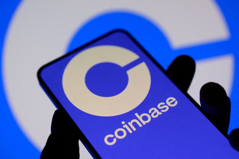 FILE PHOTO: The Coinbase logo on a smartphone screen in this illustration taken November 3, 2025. REUTERS/Dado Ruvic/Illustration/File Photo