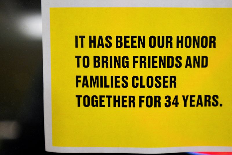 FILE PHOTO: A message from Spirit Airlines at Orlando International Airport, as the airline announced it was ceasing operations early Saturday morning following an impasse in talks with some creditors on a $500 million government bailout plan, in Orlando, Florida, U.S., May 2, 2026. REUTERS/Miguel Rodriguez/File Photo